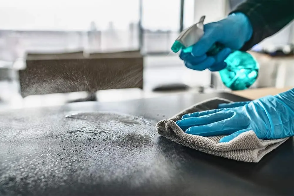 Industry leaders collaborating at a hygiene manufacturing partnership event